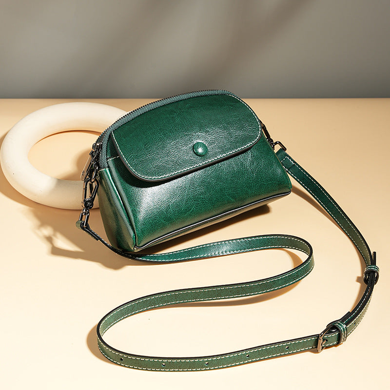 Mini leather flap crossbody bag — detail view
