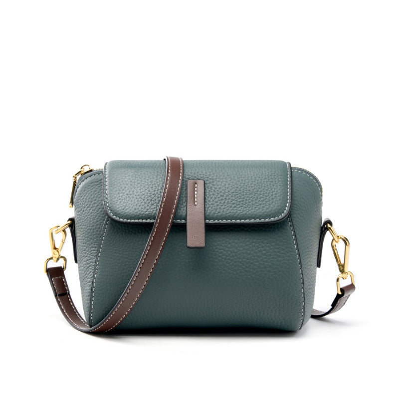 Small leather shell crossbody bag — detail view