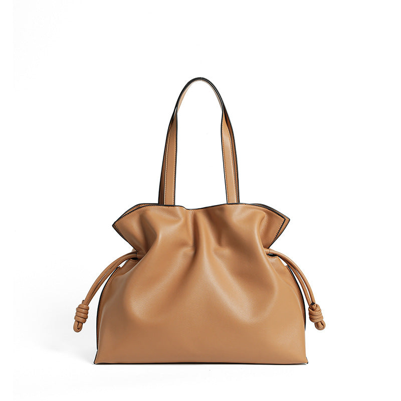 Cloud-pleated leather drawstring tote — detail view