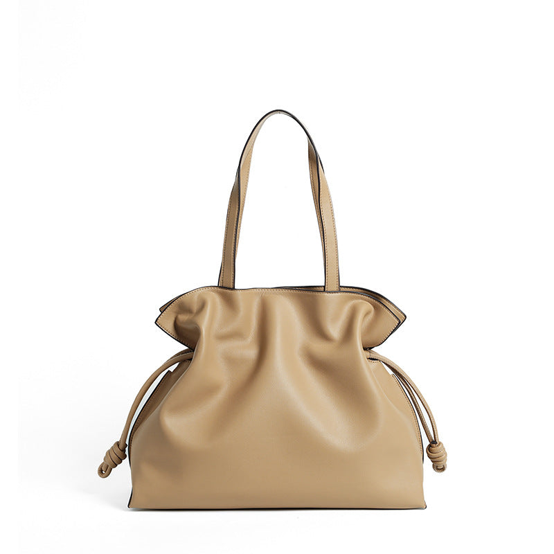 Cloud-pleated leather drawstring tote — detail view