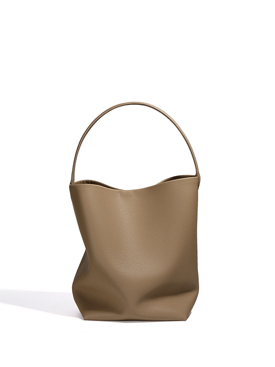 Pebbled leather bucket tote — detail view