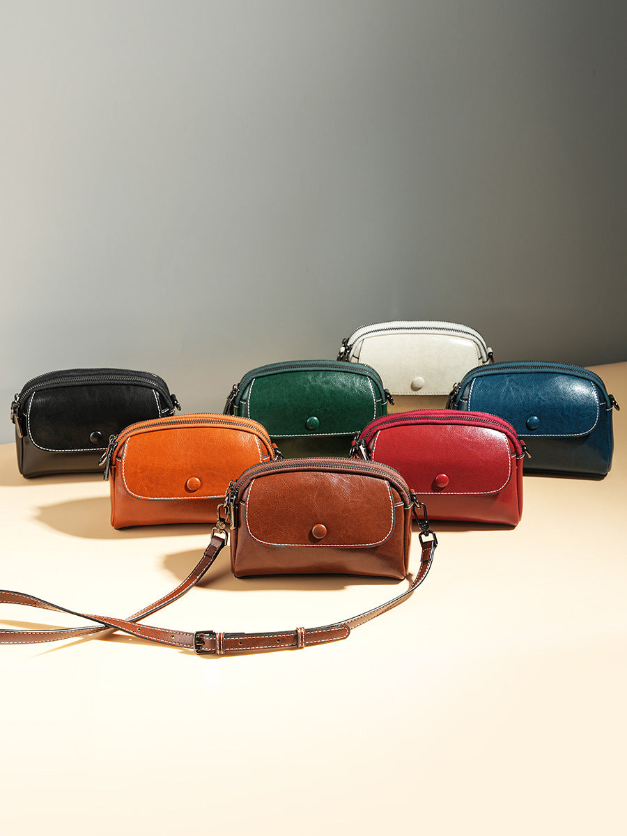 Mini leather flap crossbody bag — detail view