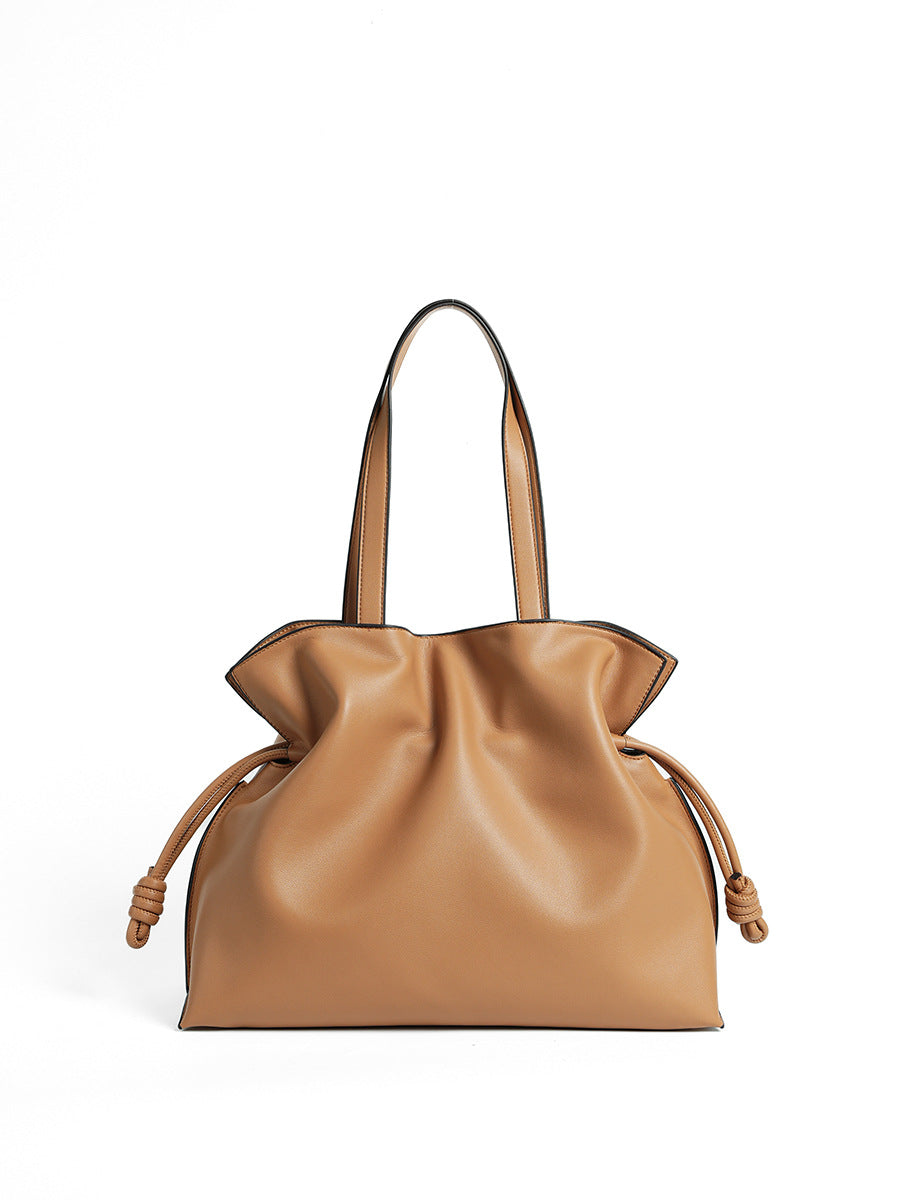 Cloud-pleated leather drawstring tote — detail view