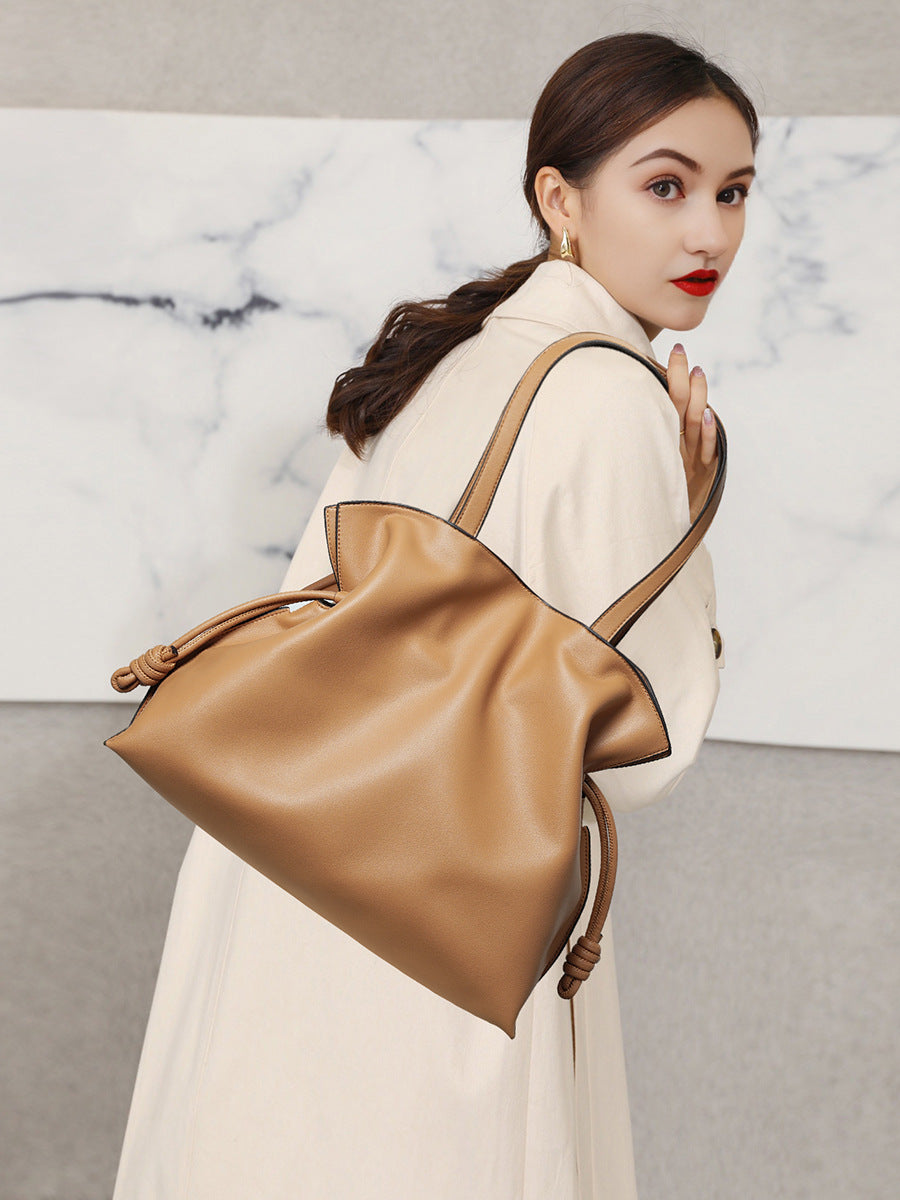 Cloud-pleated leather drawstring tote — detail view