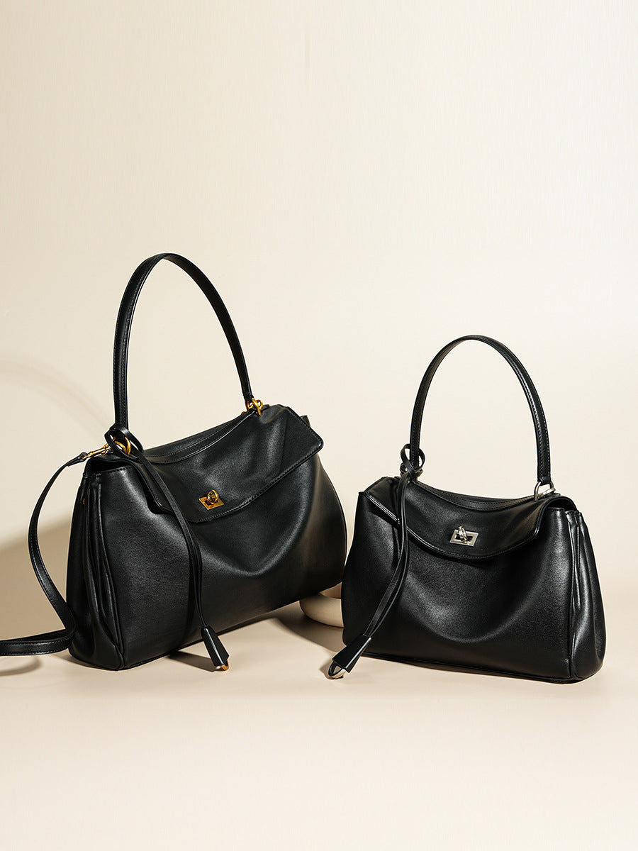 Leather ring-detail shoulder tote — detail view