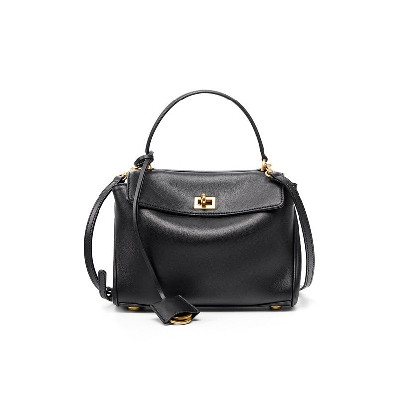 Leather ring-detail shoulder tote — detail view